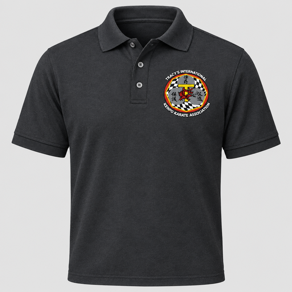 Dark gray polo shirt with original T.I.K.K.A. chest logo on a light gray background.