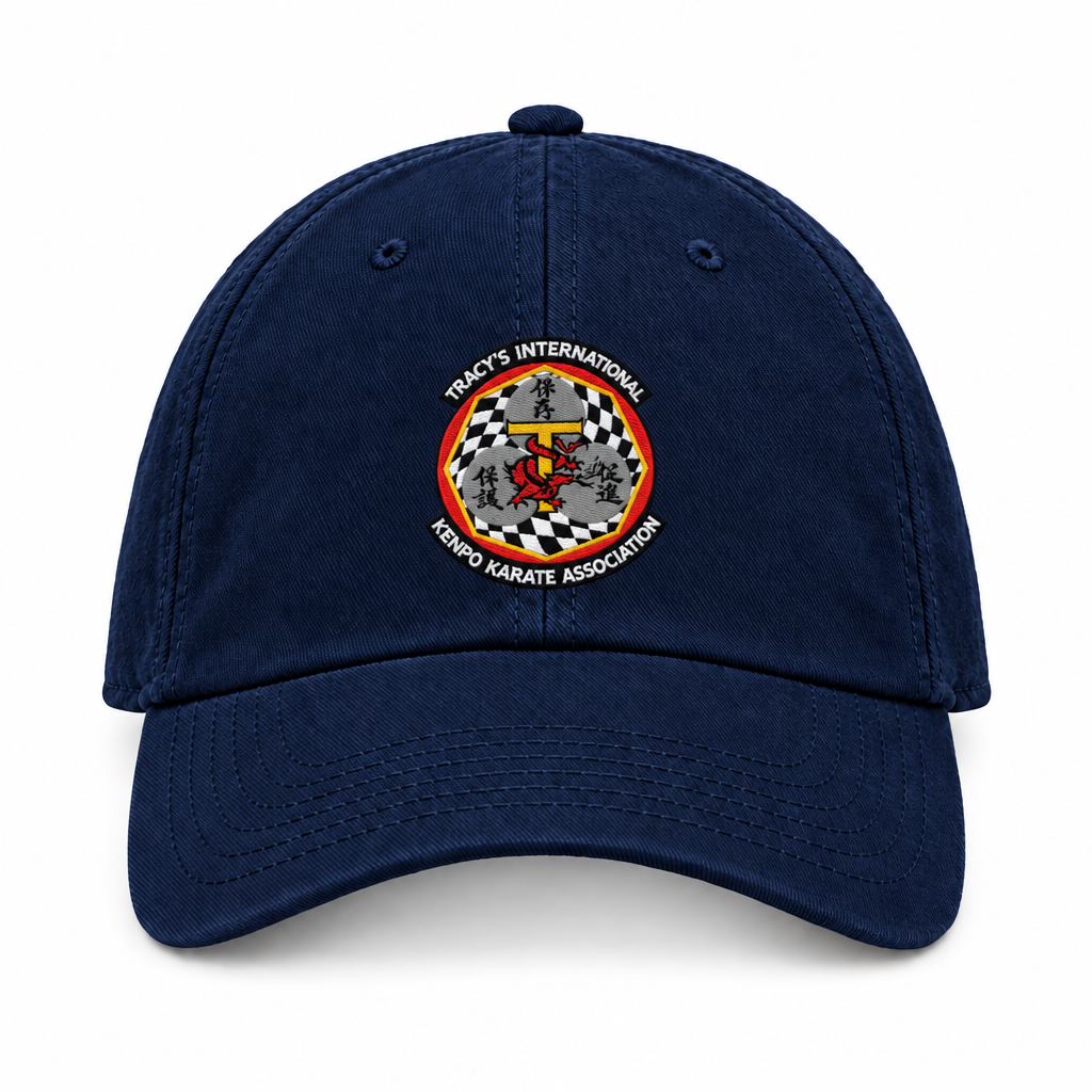 Navy blue baseball cap with the original T.I.K.K.A. logo centered on the front.
